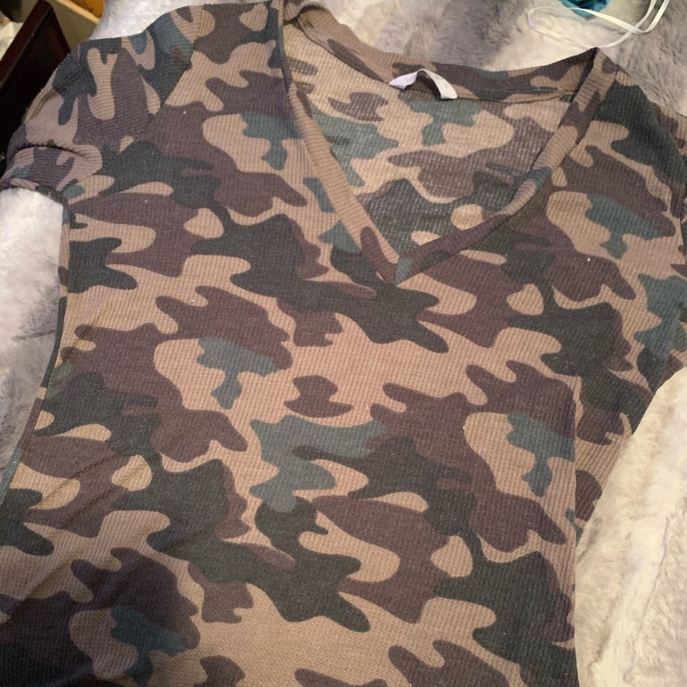 Camo shirt.